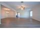 Spacious living room with light walls and wood-look floors at 7213 Las Casas Dr, Sarasota, FL 34243