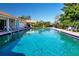 Inviting community pool with blue, clear water at 7213 Las Casas Dr, Sarasota, FL 34243