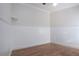 Empty room with white wainscoting and hardwood floors at 7213 Las Casas Dr, Sarasota, FL 34243
