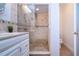 Large walk-in shower with tile surround and glass door at 7213 Las Casas Dr, Sarasota, FL 34243
