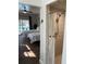 Guest bathroom with shower and view of bedroom at 7408 Oak Run Ln, Sarasota, FL 34243