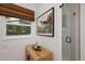 Spa-like bathroom with a walk-in shower and natural light at 7408 Oak Run Ln, Sarasota, FL 34243