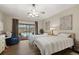 Bedroom with two twin beds, pool view, and sliding glass doors at 7408 Oak Run Ln, Sarasota, FL 34243