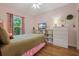 Bedroom with built-in shelving and a view at 7408 Oak Run Ln, Sarasota, FL 34243