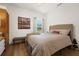 Bright bedroom with a comfortable bed and natural light at 7408 Oak Run Ln, Sarasota, FL 34243