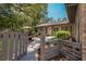 Private patio with a gate and walkway at 7408 Oak Run Ln, Sarasota, FL 34243