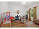 Bright bedroom with built-in storage and a workspace at 7408 Oak Run Ln, Sarasota, FL 34243