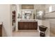 Spa-like bathroom with a large shower, double vanity, and plenty of storage at 7504 Windy Hill Cv, Lakewood Ranch, FL 34202