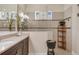 Modern bathroom features a walk-in shower, double vanity, and stylish finishes at 7504 Windy Hill Cv, Lakewood Ranch, FL 34202