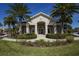 Community center building with palm trees at 8150 Enclave Way # 104, Sarasota, FL 34243