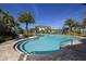 Large community pool with plenty of space for swimming at 8150 Enclave Way # 104, Sarasota, FL 34243