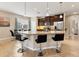 Modern kitchen with granite countertops and stainless steel appliances at 8150 Enclave Way # 104, Sarasota, FL 34243