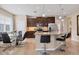 Modern kitchen with granite countertops and stainless steel appliances at 8150 Enclave Way # 104, Sarasota, FL 34243
