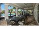 Enjoy the resort-style pool from this covered patio area at 8150 Enclave Way # 104, Sarasota, FL 34243