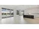Open-concept kitchen featuring sliding glass doors to the outdoor pool area at 8376 Sea Glass Ct, Sarasota, FL 34240