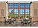 Bright dining area with golf course views at 8402 Grand Estuary Trl # 101, Bradenton, FL 34212