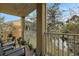 Balcony with a ceiling fan and furniture, and views of the backyard and water at 8889 White Sage Loop, Lakewood Ranch, FL 34202