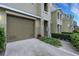 Townhouse exterior with garage and landscaping at 8889 White Sage Loop, Lakewood Ranch, FL 34202
