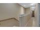 Upstairs hallway with carpeted floors and neutral walls at 8889 White Sage Loop, Lakewood Ranch, FL 34202