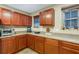 Kitchen area with stainless steel appliances and views of the window at 8889 White Sage Loop, Lakewood Ranch, FL 34202