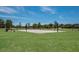 Outdoor basketball court with two hoops at 14146 Cattle Egret Pl, Bradenton, FL 34202