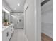 Bathroom with double vanity, walk-in shower and closet at 14146 Cattle Egret Pl, Bradenton, FL 34202