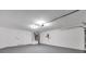 Spacious garage with ample storage space and epoxy flooring at 14146 Cattle Egret Pl, Bradenton, FL 34202
