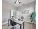 Spacious home office with built-in desk and large window at 14146 Cattle Egret Pl, Bradenton, FL 34202