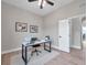 Bright home office features a workspace with hardwood floors at 14146 Cattle Egret Pl, Bradenton, FL 34202