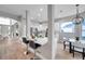 Modern kitchen with white cabinets, island, and stainless steel appliances at 14146 Cattle Egret Pl, Bradenton, FL 34202