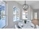 Kitchen nook with round table, view of pool and plenty of natural light at 14146 Cattle Egret Pl, Bradenton, FL 34202
