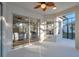 Bright lanai with sliding glass doors leading to the pool at 14146 Cattle Egret Pl, Bradenton, FL 34202