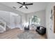Open living area with hardwood flooring, staircase and natural light at 14146 Cattle Egret Pl, Bradenton, FL 34202