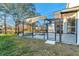 Screened pool and spa with serene lake views at 14146 Cattle Egret Pl, Bradenton, FL 34202