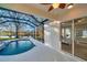 Spacious pool and spa with access from a covered lanai at 14146 Cattle Egret Pl, Bradenton, FL 34202
