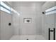 Walk-in shower with modern gray tile and glass enclosure at 14146 Cattle Egret Pl, Bradenton, FL 34202