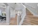 Elegant staircase leading to the second floor at 14146 Cattle Egret Pl, Bradenton, FL 34202