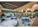 Elegant dining room with ample seating for residents and guests at 16606 San Nicola Pl, Lakewood Ranch, FL 34211