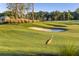 Sand trap and a crane on a scenic golf course at 16606 San Nicola Pl, Lakewood Ranch, FL 34211