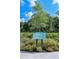Educational pollinator garden with diverse plant species and information at 16606 San Nicola Pl, Lakewood Ranch, FL 34211