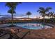 Inviting resort-style pool with lounge chairs for relaxation at 16606 San Nicola Pl, Lakewood Ranch, FL 34211