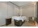 Relaxing spa treatment room with massage table at 16606 San Nicola Pl, Lakewood Ranch, FL 34211