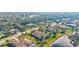 Aerial view of a house and surrounding community at 210 166Th Ne St, Bradenton, FL 34212