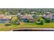 Aerial view of property showing the home, pool, and waterfront location at 210 166Th Ne St, Bradenton, FL 34212