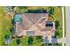 Bird's-eye view of home, pool, and landscaping at 210 166Th Ne St, Bradenton, FL 34212