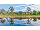 Tranquil backyard oasis with water view at 210 166Th Ne St, Bradenton, FL 34212