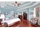 Spacious Primary bedroom with wood floors and large windows at 210 166Th Ne St, Bradenton, FL 34212