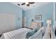 Serene bedroom with a light and airy feel, featuring a dresser at 210 166Th Ne St, Bradenton, FL 34212