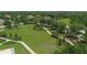 Aerial view of community park with walking paths and play area at 210 166Th Ne St, Bradenton, FL 34212