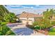 This home features a three car garage and gorgeous landscaping at 210 166Th Ne St, Bradenton, FL 34212